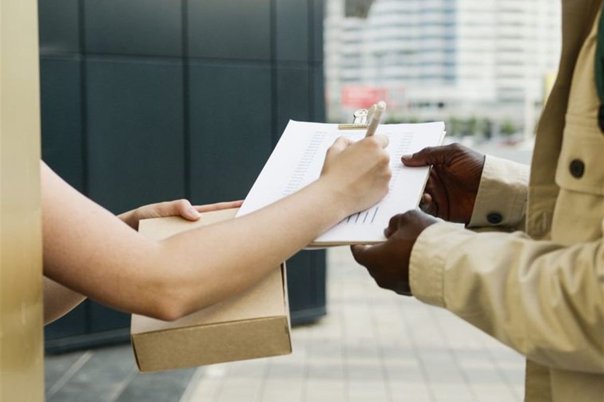 A delivery being handed over inside a residential community